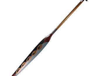 JERRY LAKTONEN ALUTIIQ CEREMONIAL PADDLE | Titled “Rite of Passage” hand painted Alutiiq oar with original tag, signed "J.J.L." and dated "10.02". - l. 60 x w. 4 in