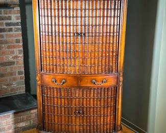 SHERRILL OCCASIONAL TV CABINET | Mahogany cabinet with faux book carving relief on sliding doors to reveal media cabinet with 2 drawers. -  l. 36 x w. 26 x h. 64.25 in