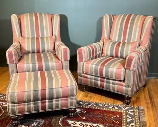 LEXINGTON WING BACK ARMCHAIRS & OTTOMAN | 
Striped wing back armchairs by Lexington Home Brands with brass riveted border and spindle carved mahogany feet on both chairs and ottoman. - l. 32.5 x w. 31.5 x h. 41 in (chairs)