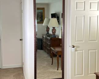 FULL-LENGTH MIRROR | Beveled glass and mirror with carved wood frame featuring flora and fauna relief. - w. 27.5 x h. 75.25 in