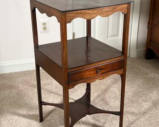 GEORGE III MAHOGANY WASH STAND | Small mahogany side table with 2 shelves, small drawer and x-stretcher. - l. 16.25 x w. 16 x h. 32.5 in