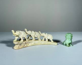 (2PC) JADE & STONE ANIMAL CARVINGS | Including; small jade lion figurine and graduated elephants walking up an incline. - l. 7.5 x w. 2.75 x h. 3 in