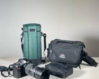 (4PC) NIKON CAMERA & OTHER EQUIPMENT | Including; Nikon D70S digital camera with ProMaster AF 70-300mm 1:4 - 5.6 LD Tele-Macro (1:2) lens, SIGMA 170-500mm 1:5 - 6.3 APO lens with branded padded carrying case, Minolta Progam 5400 HS photoflash unit, and Tamrac padded camera case. 
