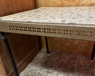 This is honestly something I have never seen at one of our sales - a child size foldable card table. All metal with a fantastic heavy vinyl top in a terrific 1950's/60's pattern! 