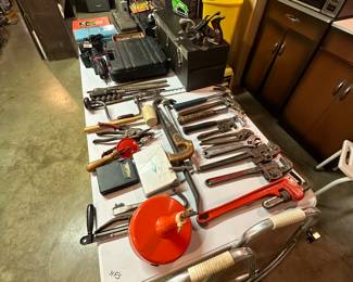 An 8 ft table FILLED with vintage tools! 