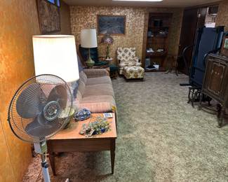On either dies of the couch are SUPERB MCM lamps on end tables! 