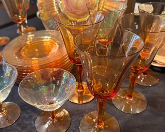 A entire collection of Amber Glass! Charger, plates, glasses, candles sticks etc...BEAUTIFUL! 