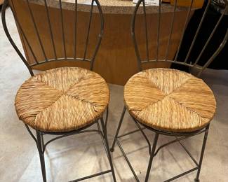 Here is a pair of GREAT swivel counter stools! Gun Metal Gray with Wicker seats! UBER sturdy and in great condition! 