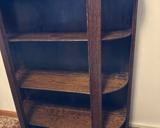 Unique repurposed Oak Victorian shelving unit! This was originally a china cabinet with round red glass on the sides and the door. The door and all the glass are long gone, but it makes an excellent display piece! 