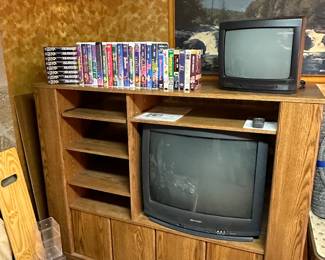 This TV and Entertainment center is ready to go! Lots of VHS tapes and DVD's too! 