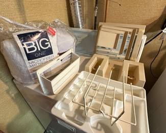 Lots of plastic Kitchen organizing pieces! Please Note: The Washer and Dryer are NOT being sold. They are staying with the house! 