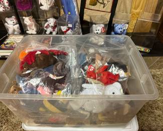 There is nice collection of Beanie Babies, Books and a poster! These were already placed in collectors boxes, the rest are bagged in a tote! 