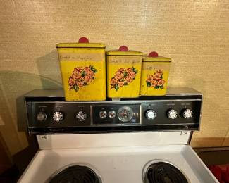 Set of three vintage 1940’s Metal Canisters. Red Bakelite Handles! 
