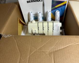 The Bernina 2000 Serger. Mint in the original box. Also we have Bernina books, patterns, videos etc...