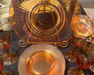 A entire collection of Amber Glass! Charger, plates, glasses, candles sticks etc...BEAUTIFUL! 
