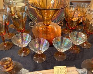 A entire collection of Amber Glass! Charger, plates, glasses, candles sticks etc...BEAUTIFUL! 