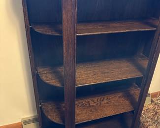 Unique repurposed Oak Victorian shelving unit! This was originally a china cabinet with round red glass on the sides and the door. The door and all the glass are long gone, but it makes an excellent display piece! 