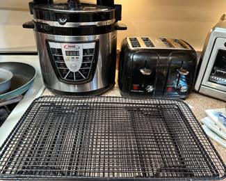 Pressure Cooker, Toaster and some really nice coloring racks! 