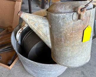 antique tin pail and water can