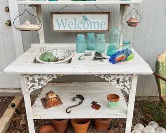 handmade potting table, vintage glass insulators, vintage Ball jars
