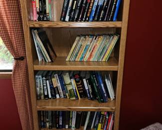 Wooden bookshelf and books