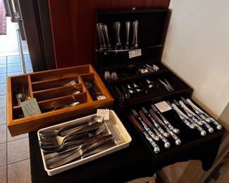 In wooden chest: Towl Beaded stainless 18/10. and modernist stainless flatware