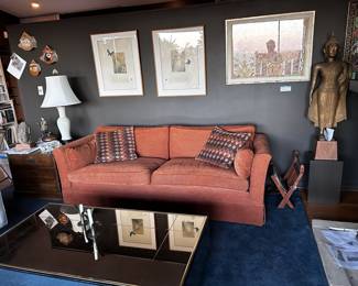 Tangerine 7 foot x 33 inches sofa. MCM arm chair, 1980's mirrored "floating" coffee table.