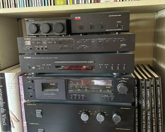 Yamaha stereo Tuner T-70 , Yamaha compact disc player CD S-300, Nakamichi CR-1A 2 head cassette player, triple stack Exposure pre and power amps