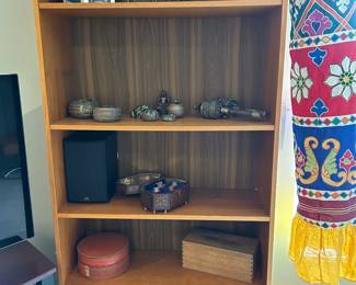 Tall Teak bookshelf with adjustale shelves, Indian metal toys, repurposed Indian brass and bronze bangles and metalware, enameled boxes, miniatures, etcl