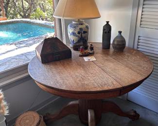42" diameter , 29" tall oak table with ball and claw feet