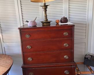 Mahogany high boy, chest on chest. 34 inches across and 19 inches deep. 52 inches height. 5 drawers, solid wood. 