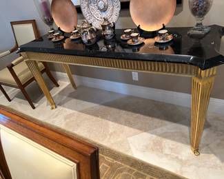 side table with a black marble top