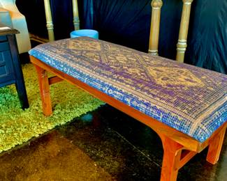 Mission style bench with beautiful color you can sit on.