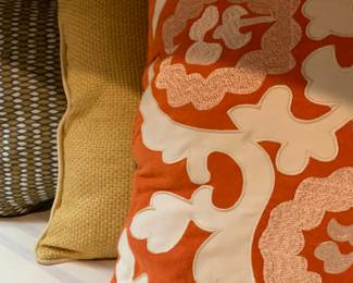 Throw pillows bring cheerful color to ordinary spaces