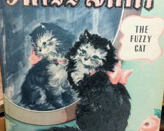 Original vintage fuzzy wuzzy flocked Cat book titled Miss Smith