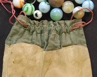 Vintage cowhide and cloth antique drawstring bag with marbles