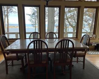 Granite top table with 8 chairs 