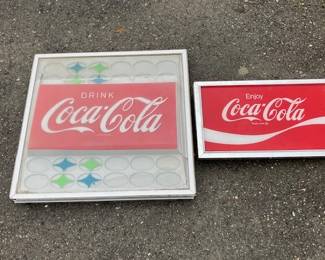 COKE SIGNS TWO