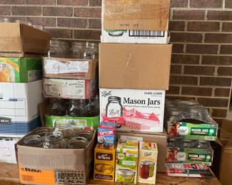 Lots of canning jars and supplies 