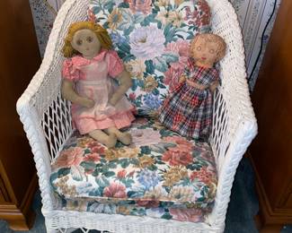 Wicker chair with floral cushions