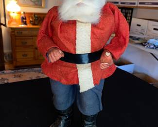 Santa’s not looking too jolly at the moment .. just fill him with candy and see how things change… careful and watch his sugar levels!