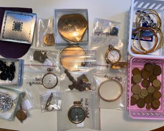 Pocket watches, compacts, coins and more