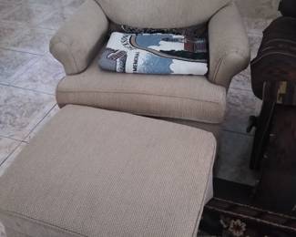 Swivel rocker with rolling ottoman