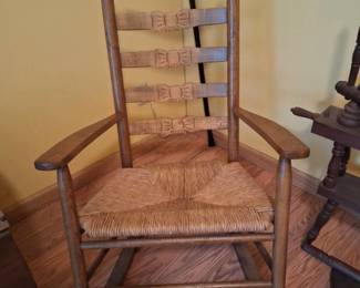 Antique Carved Ribbon Rocking Chair with Woven Seat
