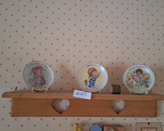 Wooden Heart Shelf with Collectible Plates and Stamp Case