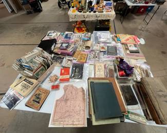 TABLE OF EPHEMERA INCLUDING PHOTOS, POSTCARDS,TINTYPES, CABINET CARDS, CDV'S, MAPS, LEDGERS AND MORE!