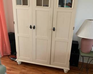 White Cabinet with shelving, has writing table inside
