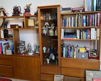 Entertainment center full of collectibles 