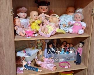 Games; Toys, Dolls - Played with and Brand New in the Box!  You'll find Bratz dolls (even a male), Baby Patch; Playskool, Mattel, Hasbro and more.  Even the Storage Cabinet with doors in this photo is for sale!