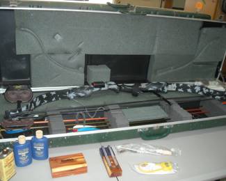 Ben Pearson Hunting Bow in fitted camouflage hard case